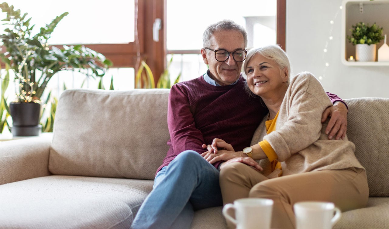 older couple sitting together