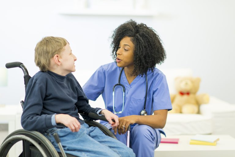 A child with special needs visits his dotor.