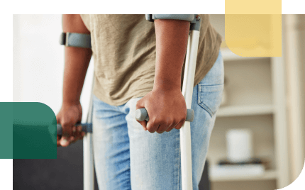 person using crutches due to a personal injury