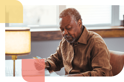 Older male reviews his thrift savings plan